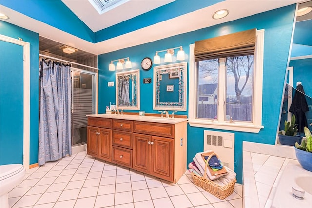 bathroom featuring radiator, a shower with curtain, vaulted ceiling, tile patterned flooring, and toilet