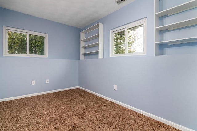 view of carpeted spare room