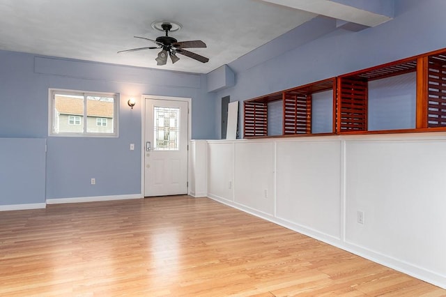 entrance foyer featuring ceiling fan and light wood-type flooring