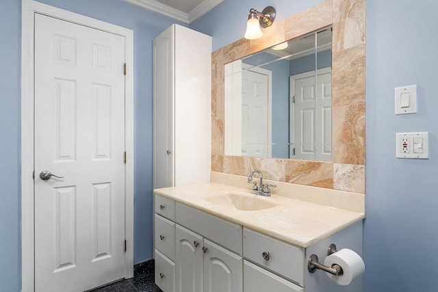 bathroom featuring vanity and ornamental molding