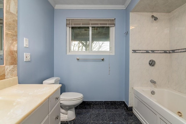 full bathroom featuring crown molding, toilet, vanity, and tiled shower / bath