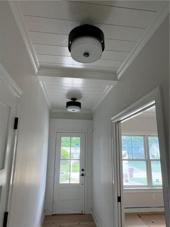 15 Cora St, East Greenwich, RI 02818 - doorway featuring crown molding and wood finished floors