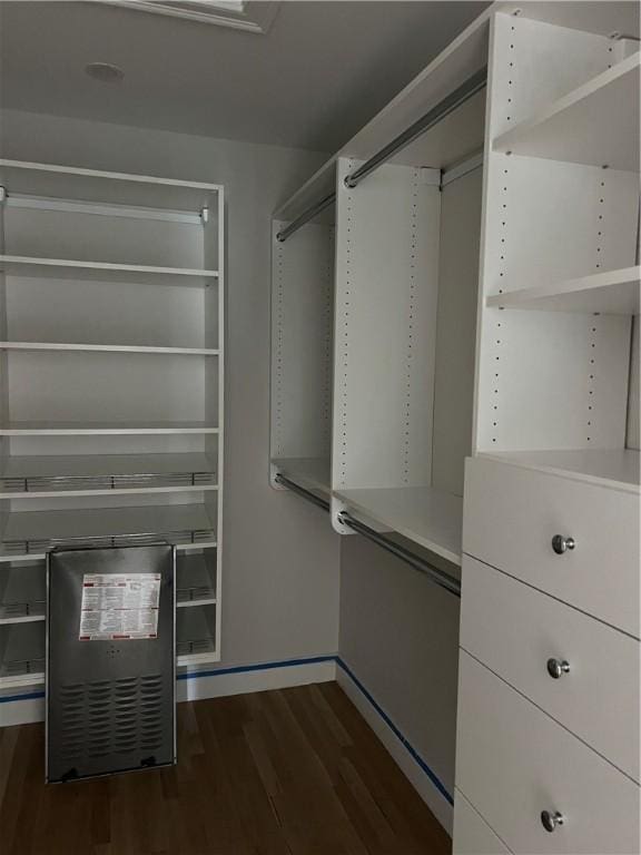15 Cora St, East Greenwich, RI 02818 - spacious closet featuring dark wood-style floors