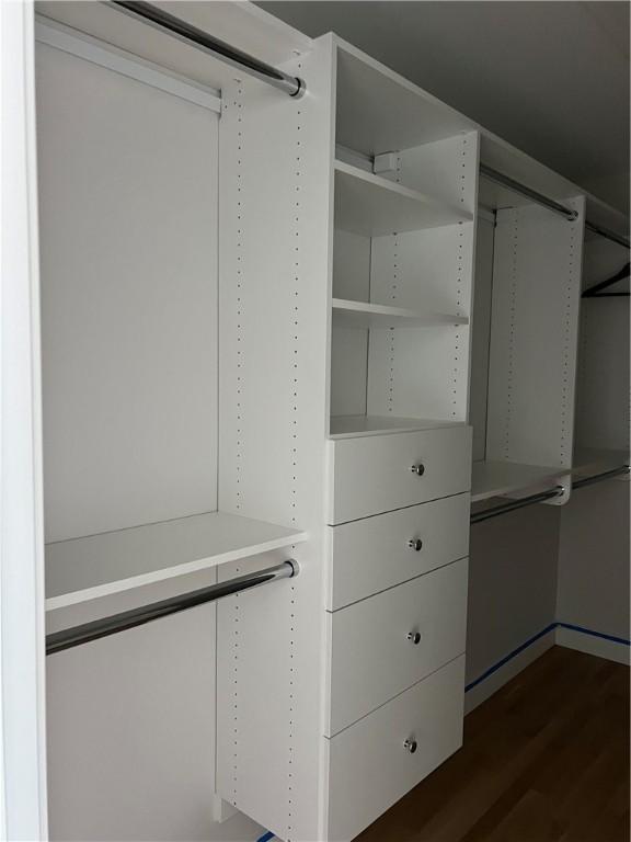 15 Cora St, East Greenwich, RI 02818 - spacious closet featuring dark wood finished floors