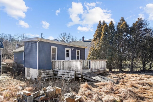 view of front of property featuring a wooden deck