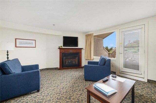 living room featuring dark colored carpet