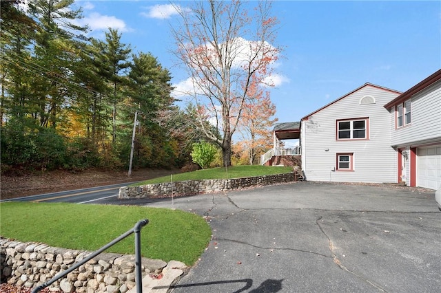 view of yard featuring a garage