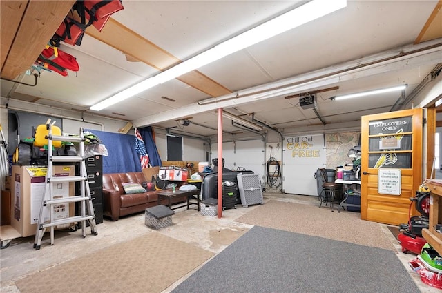 garage featuring a garage door opener