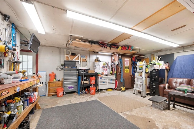 garage with a workshop area