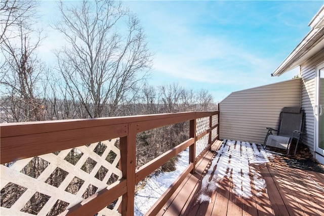 view of snow covered deck