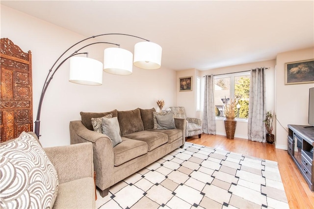 living room with light hardwood / wood-style flooring