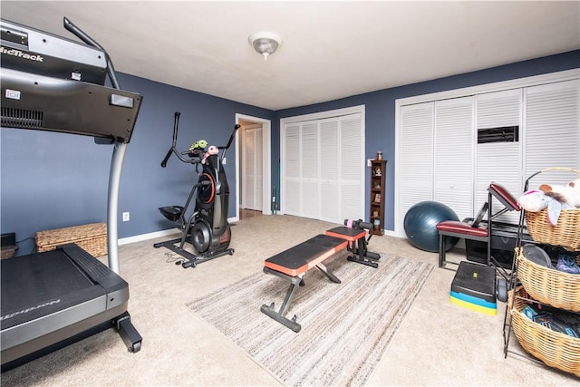 workout area with carpet floors