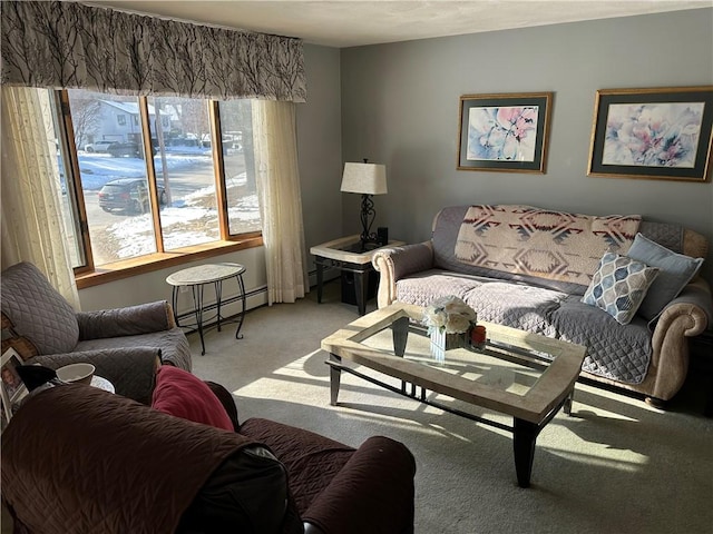 living room featuring light carpet and a baseboard heating unit