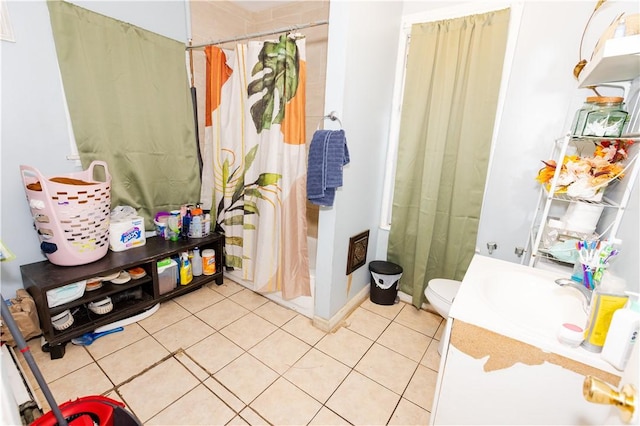 bathroom featuring vanity, toilet, tile patterned floors, and a shower with shower curtain