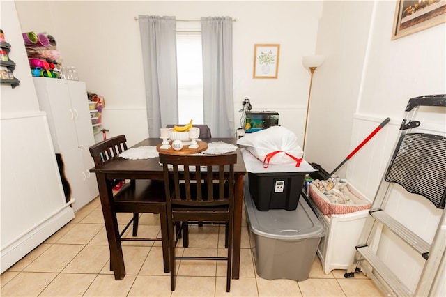 dining space with light tile patterned floors