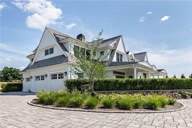 view of home's exterior with a garage