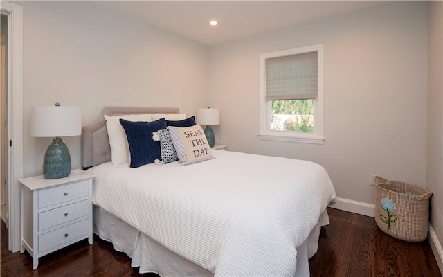 bedroom featuring dark wood-type flooring