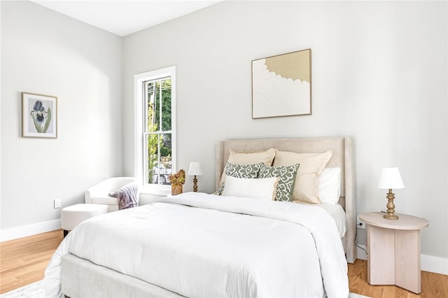 bedroom with wood-type flooring