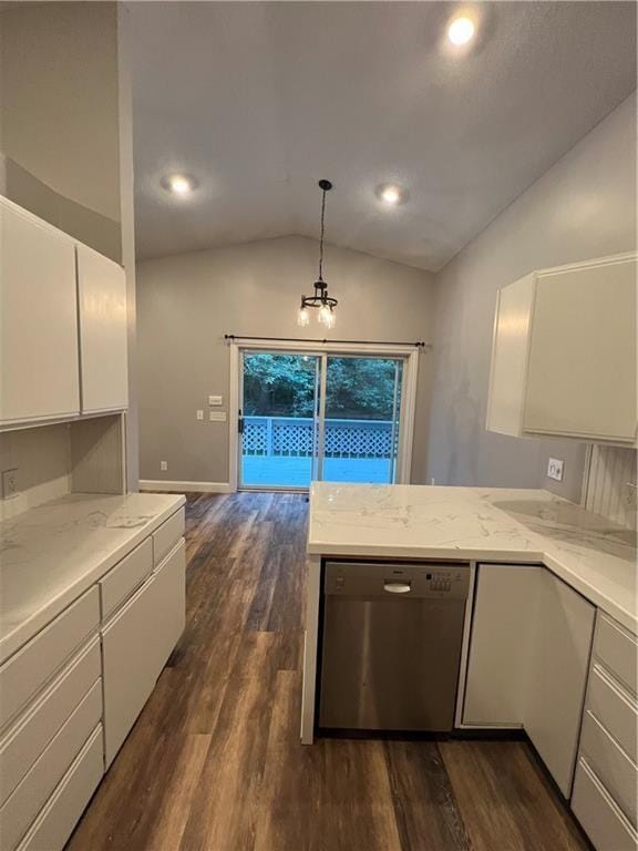 kitchen with white cabinets, hanging light fixtures, vaulted ceiling, stainless steel dishwasher, and dark hardwood / wood-style floors