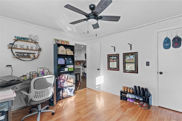 office featuring hardwood / wood-style flooring and ceiling fan