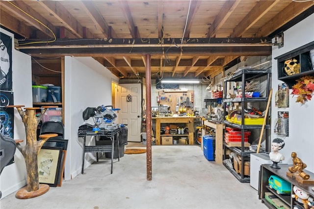 basement with a workshop area