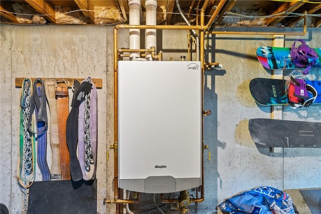 utility room featuring water heater