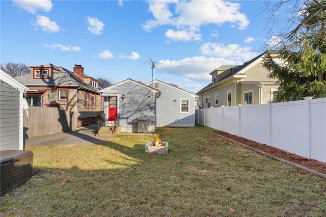 view of yard with an outdoor fire pit