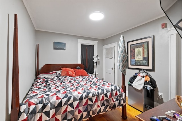 bedroom featuring wood-type flooring