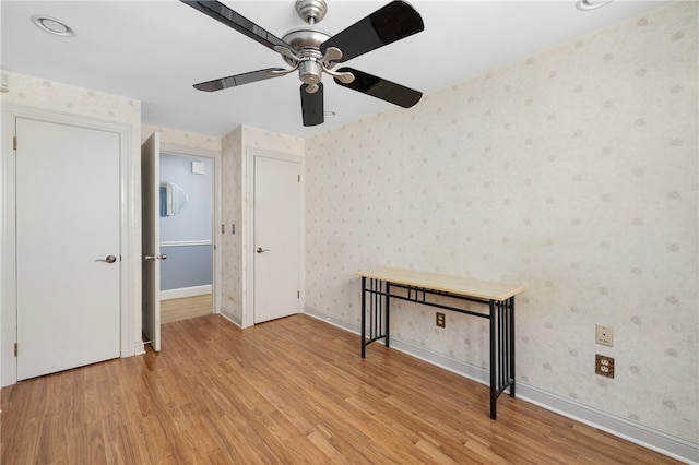 interior space featuring ceiling fan and light hardwood / wood-style floors