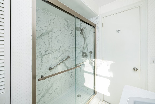 bathroom featuring an enclosed shower