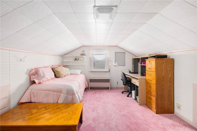 carpeted bedroom featuring radiator heating unit and vaulted ceiling