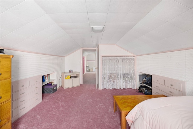 bedroom featuring carpet flooring and lofted ceiling