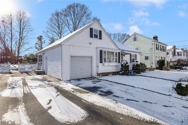 view of front of home featuring a garage