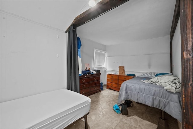 bedroom with lofted ceiling