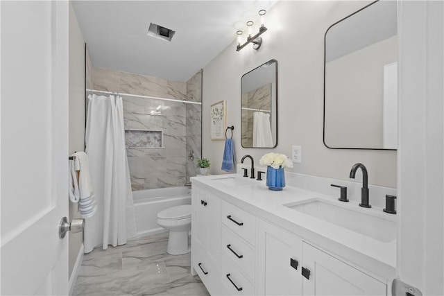 full bathroom featuring vanity, toilet, and shower / tub combo with curtain