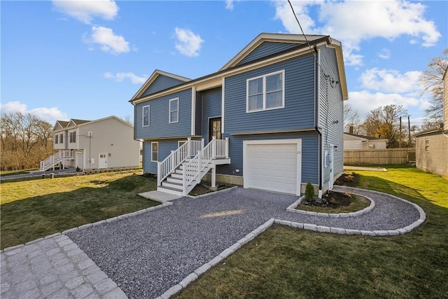 bi-level home featuring a front yard and a garage