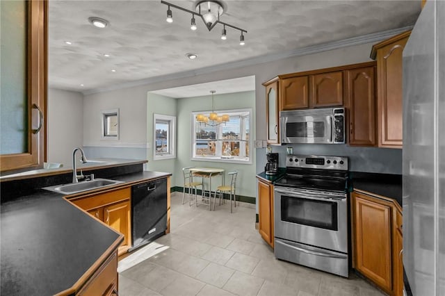 kitchen with stainless steel appliances, crown molding, sink, decorative light fixtures, and a chandelier