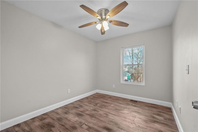 unfurnished room featuring ceiling fan and wood-type flooring