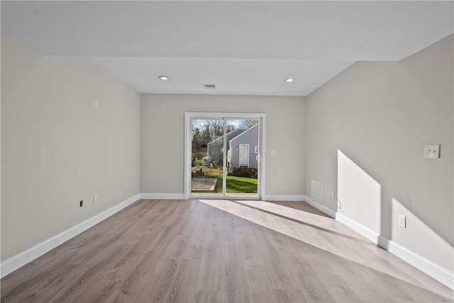 unfurnished living room featuring light wood-type flooring