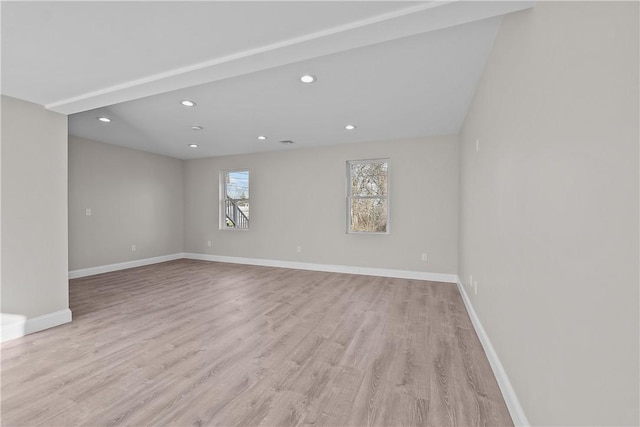 spare room featuring light hardwood / wood-style flooring