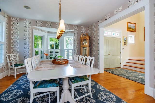 dining room with hardwood / wood-style floors and plenty of natural light