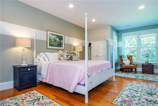 bedroom featuring wood-type flooring