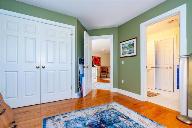 hall featuring light wood-type flooring