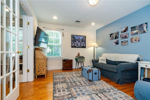 living room with hardwood / wood-style floors