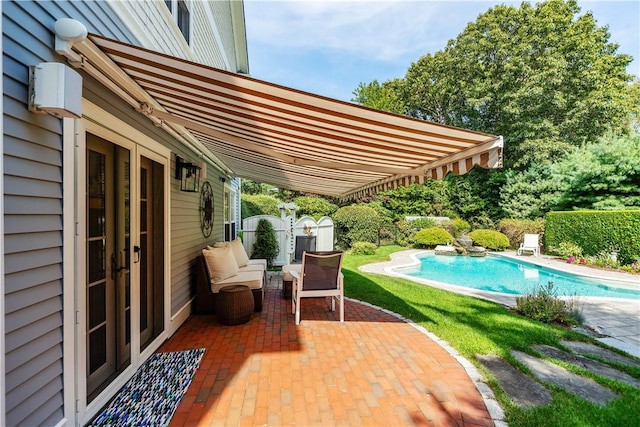 view of pool with a patio area