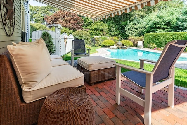 view of patio featuring a fenced in pool