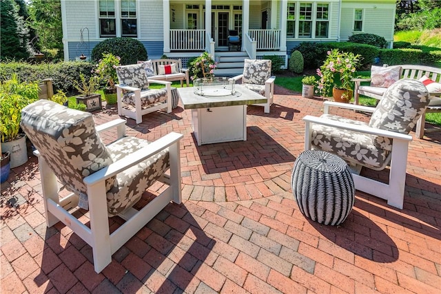 view of patio featuring covered porch and an outdoor hangout area