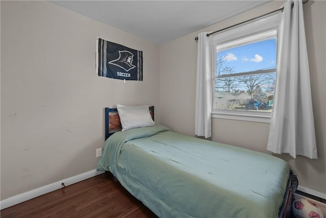 bedroom featuring dark hardwood / wood-style floors