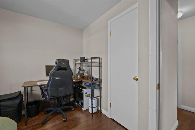 home office featuring dark hardwood / wood-style flooring