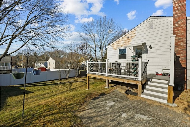 view of yard with a wooden deck